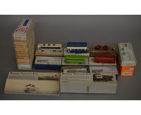 16 boxed OO scale white metal Bus,Coach and Lorry kits by Nu-Cast, Westward etc., four of the bus models have  been built, th