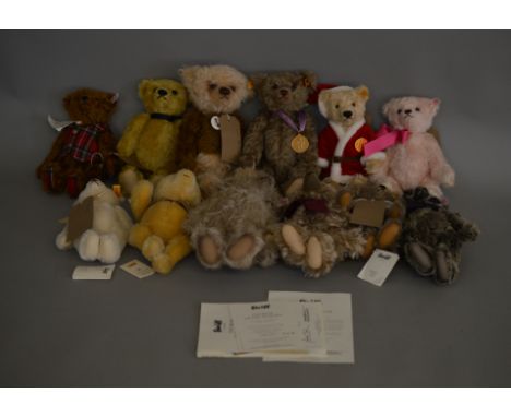 12 unboxed Steiff bears which includes Noel Christmas Bear, Hope, Memories, Hannes, Winnie The Pooh etc, mostly come with cer