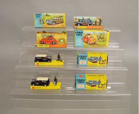 4 boxed Corgi Toys including 2 x 448 BMC Mini police Vans both with Tracker Dogs and Handlers, 256 Volkswagen 1200 in East Af
