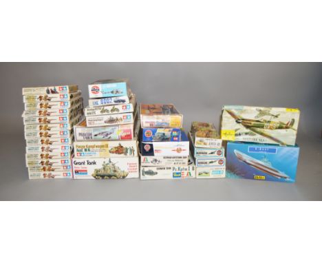 31 boxed military and aviation related plastic model kits by Airfix, Monogram, Tamiya and others including a Monogram British