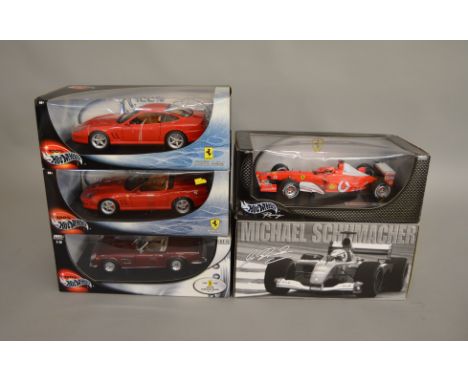 5 boxed Hot Wheels 1:18th scale Ferrari models including 250GT California Spider 4x4 and 'MIchael Schumacher 2001 World Champ