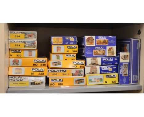 19 boxed Kibri model kits in N and HO scales including #370 Crown Pickle Factory, Antique Shop kit, etc.&nbsp; All kits in op