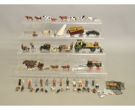 O Gauge. Over 50 unboxed plastic and metal animal and people figures together with six metal vehicles including truck, motorc
