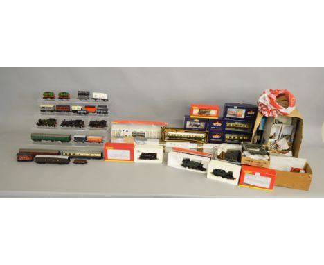 OO Gauge. 4 boxed Locomotives by Hornby, Lima and Bachmann and a further three unboxed, 3 boxed Coaches and three unboxed, to