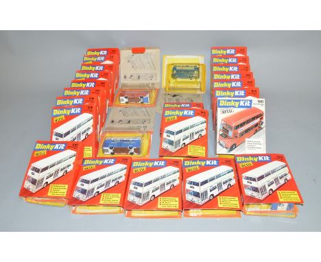 23 boxed Dinky Kits '1018 Atlantean Bus' together with two boxed '1017&nbsp; Routemaster Bus' models. All of the models have 