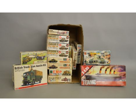 14 boxed military related plastic model kits by Revell, Tamiya and others including a Bandai British Truck 3 ton Austin K5 in