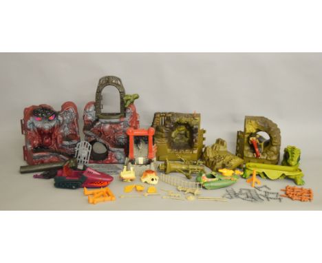 He-Man Masters Of The Universe playsets; Snake Mountain and Fright Zone by Mattel, along with some vehicles.