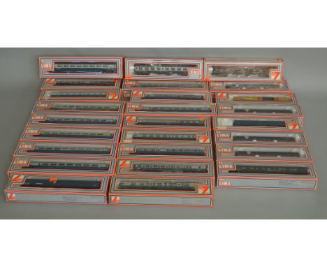OO Gauge. 26 boxed Lima Coaches and Wagons of various types.. All appear G/VG boxed. (26)