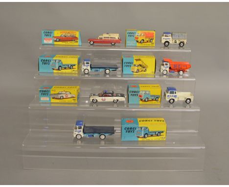 7 boxed Corgi Toys including 237 Oldsmobile Sheriff Car, 409 Jeep FC-150, 437 Superior Ambulance, 2 x 457 ERF 44G Platform Lo