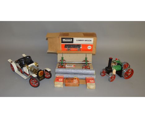 LIVE STEAM. A boxed Mamod LW.1 Lumber Wagon in green with three 'log' load together with an unboxed&nbsp;  Mamod Traction Eng