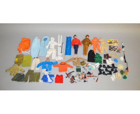 Two vintage unboxed Action Man figures, both clothed and jointed, one with flock hair together with a quantity of outfits,&nb