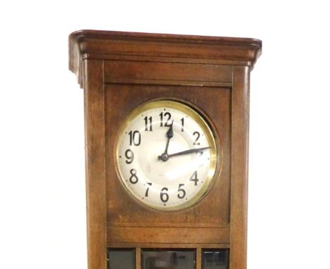 Allan Gibson of Nelson. An early 20thC oak longcase clock, circular silvered dial bearing Arabic numerals, the case inset wit