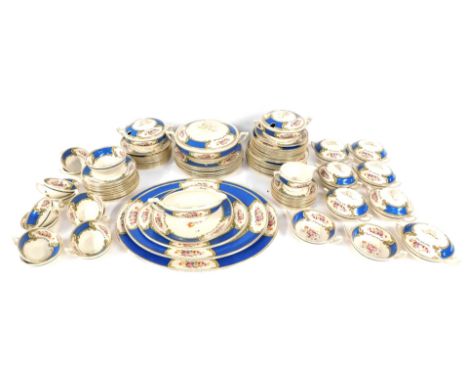 A Royal Crown Myott part tea service, on Royal blue ground with cream and gilt floral borders, comprising tea cups, saucers, 