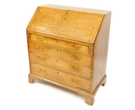 A 19thC oak bureau, the fall flap above arrangement of four drawers, with brass swing handles, on bracket feet, 105cm high, 9