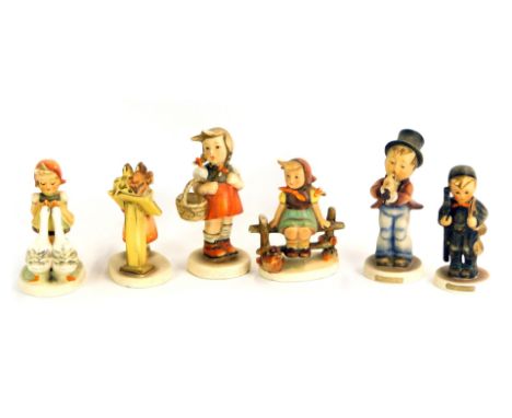 Six Hummel pottery figures, to include children playing instruments, children playing, etc. (AF)
