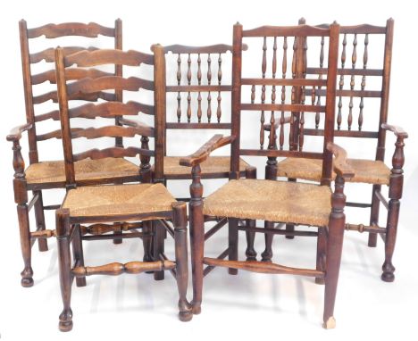 A harlequin set of five 18thC and later elm dining chairs, comprising a pair of spindle back carvers, a similar dining chair,