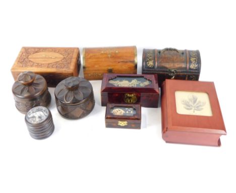 A quantity of trinket boxes, comprising a hardwood and domed topped brass inlaid trunk, a cork diorama box, and various other