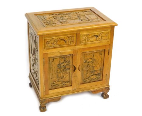 A lightwood and  yew wood side cabinet, with a carved and moulded rectangular top above arrangement of two cupboard doors, on