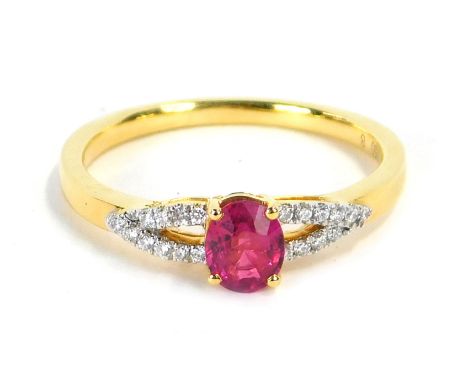 A ruby and diamond dress ring, with oval cut ruby in four claw raised basket setting, with V splayed diamond set shoulders, y