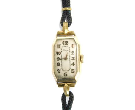 A Tempo wristwatch, in a cased hexagonal wristwatch head, with a white enamel dial marked PB Geneva, rolled gold on rope twis