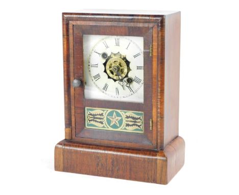 A 19thC Newhaven Clock Company American rosewood cased mantel clock, with a painted Roman numeric dial and glass star panel, 