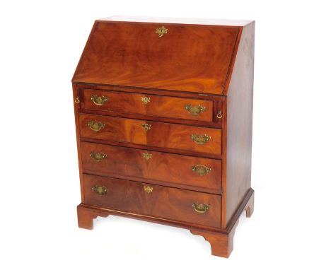 A 19thC mahogany bureau, the fall flap above an arrangement of four drawers, with brass escutcheons, on bracket feet, 103cm h