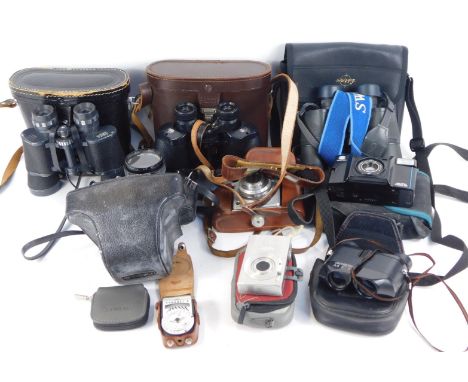 An Agfa Super Silette camera, Yashica TL Electro X camera, further cameras and binoculars, all cased. (a quantity) 
