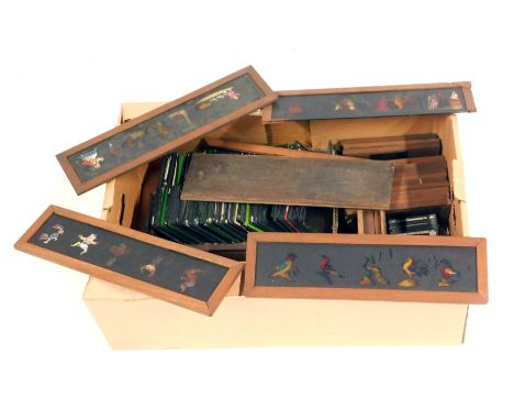 A group of Victorian magic lantern slides, comprising cartoons, glaciers, landscapes, wooden framed religious scenes, etc. (1