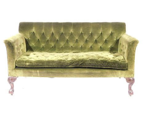 A Victorian button back sofa, the curved back with button supports, on mahogany ball and claw feet, 170cm wide, 104cm high, 6