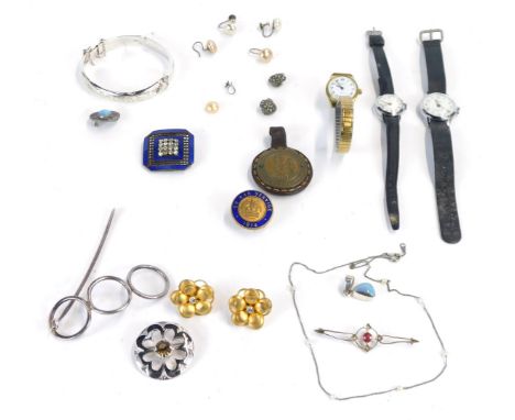 A quantity of costume jewellery, comprising blue enamel and paste stone set brooch, silver bangle, wristwatches, faux pearl e