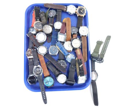 A group of gentleman's fashion watches, to include names such as Casio, W M G, Curran, Megia and others. (1 tray) 