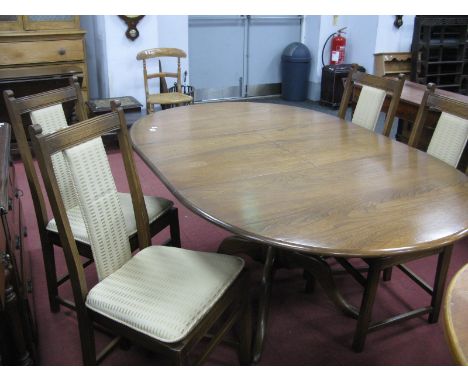 Ercol Oval Topped Dining Table, with pull-out centre leaf on bulbous pedestal and cruciform base, 170cm extended and 110cm; t