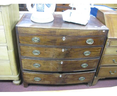 A XIX Century Mahogany Bow Fronted Chest of Drawers, a cross banded top with three long drawers, on bracket feet 10.5 cms wid