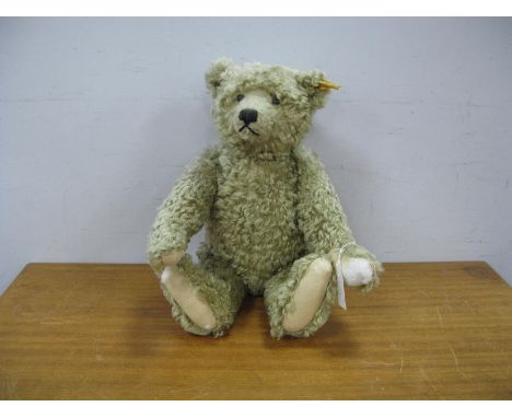 A Circa Early 2000's Steiff Bear with button and growler feature.