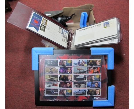 James Bond Limited Edition of 995 Ten Stamp Collection (framed), various First Day Covers and First Day Postcards, ebony elep