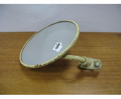 A Circa 1950's Convex Mirror, in metal frame and rear tube holder stamped "RATP", 25.5cm diameter (These were used on the sta