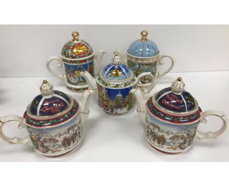A collection of approximately 40 James Sadler decorative teapots including Sporting Collections, Christmas Collections, etc, 
