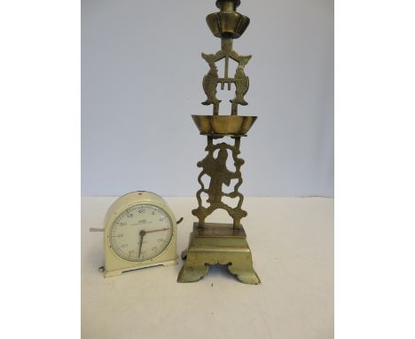 Oriental brass candles stick together with a vintage smith's timer (Height Candle stick 42 cm)