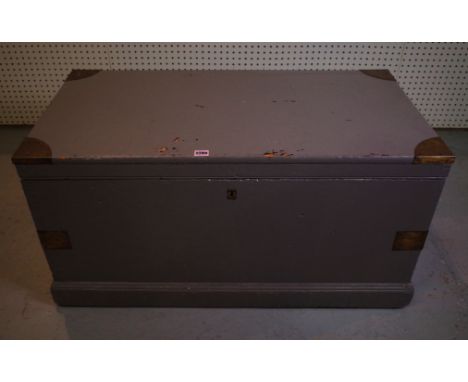 AN EARLY 20TH CENTURY GREY PAINTED TRUNKwith brass mounts 100cm wide; 41cm high