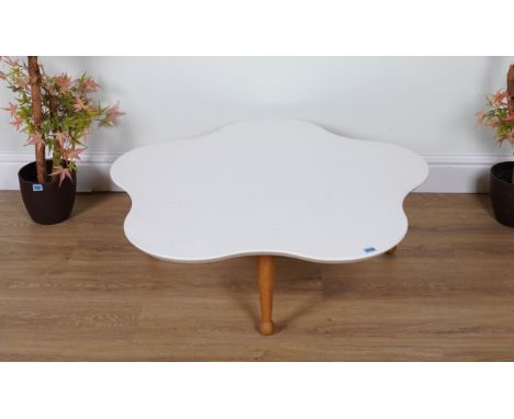 A WHITE LACQUER CIRCULAR SHAPED COFFEE TABLEon oak turned supports, 91cm wide; 32cm highCondition: Good condition, with light