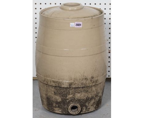 AN EARLY 20TH CENTURY SLIP GLAZED STONEWARE WATER CISTERN OF BARREL FORM (2)48cm high, and a mid 20th century standard lamp, 