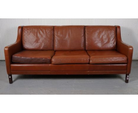 A MID 20TH CENTURY LEATHER UPHOLSTERED THREE SEAT SOFA179cm wide; 75cm high