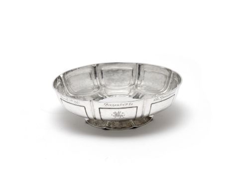 Parliamentary Interest: a silver dishWilliam Comyns, London 1910 In the 17th century style, engraved with the Lowther crest a