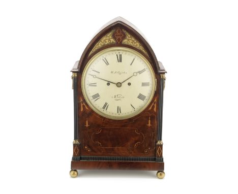 An early 19th century boxwood-inlaid mahogany bracket clockthe dial signed W.J Upjohn, Londonthe lancet case with lions mask 