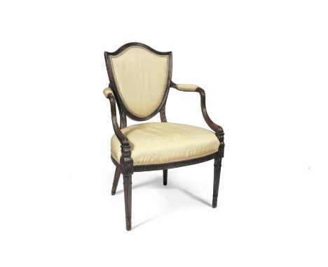 A George III stained beech open armchair attributed to Gillowsafter a design by James WyattCirca 1786, with a channelled shie