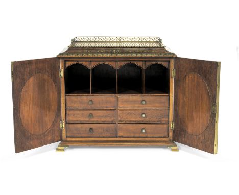 A good late 19th century Sheraton revival painted satinwood, inset silk needlework and gilt brass mounted table cabinetthe wh