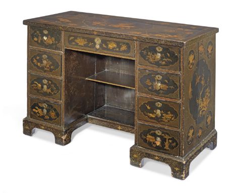 A Chinese export 18th century lacquer kneehole deskDecorated with horses, birds, stags, dragons, insects, trees, censers, ass