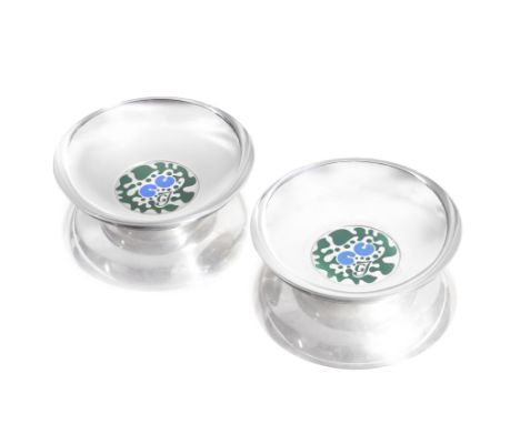 GEORG JENSEN: a pair of Danish silver and enamel bowlspost 1945 marks, designed by Henning Koppel, with facsimile signature T
