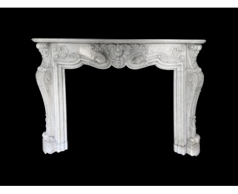 A late 19th century French carved white marble 'Pompadour' chimneypiecein the Louis XV stylethe serpentine moulded shelf abov