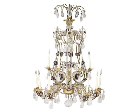 A gilt brass and cut and moulded clear and amethyst beaded glass and rock crystal fifteen light chandelierprobably French or 